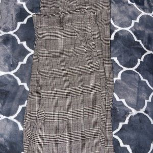 Grey plaid pants.
